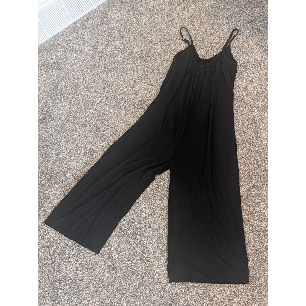 Black Wide Leg Jumpsuit Size Medium Adjustable Straps Flowy Romper Free People D